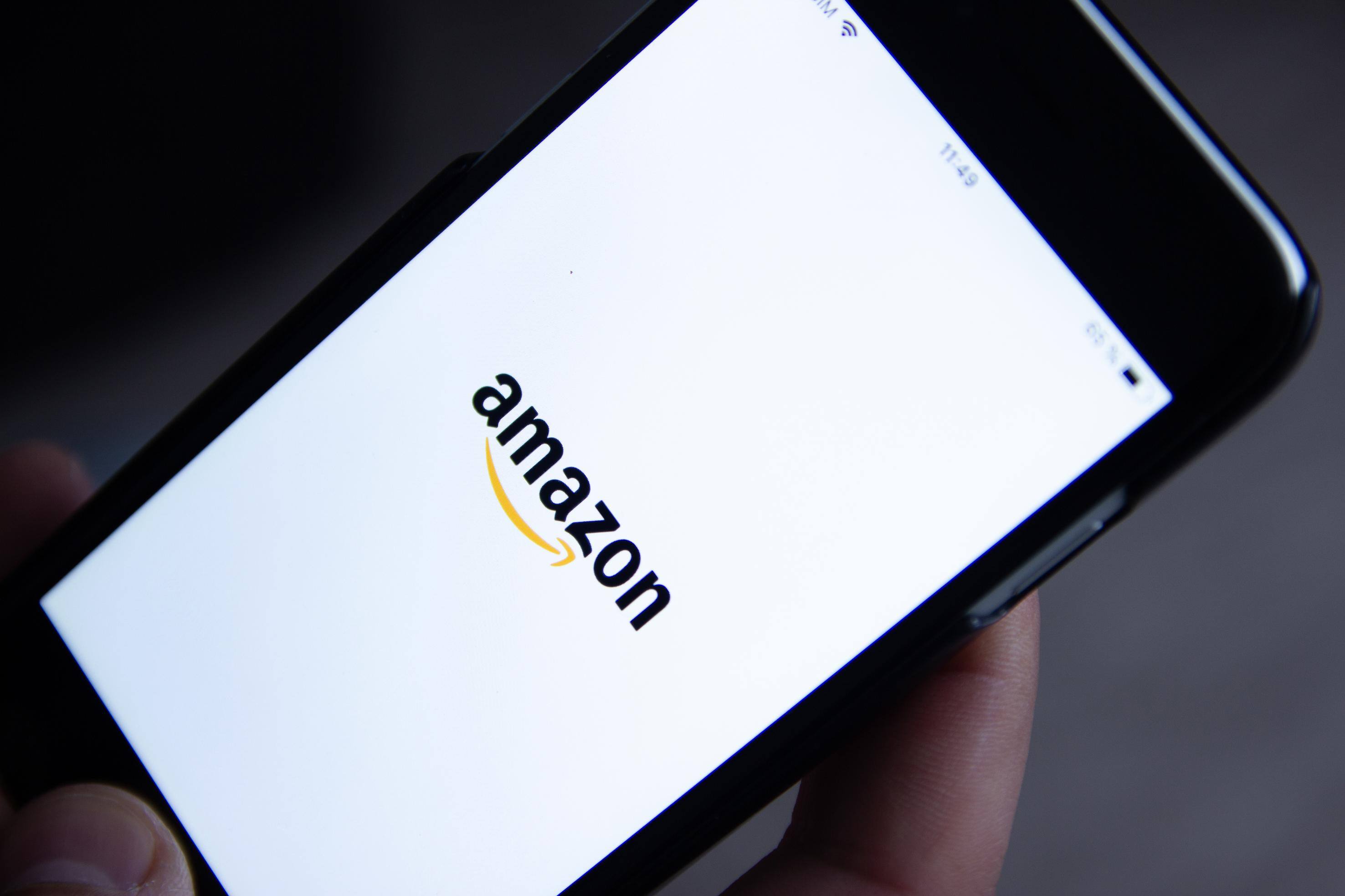 Picture of an Amazon logo on a phone