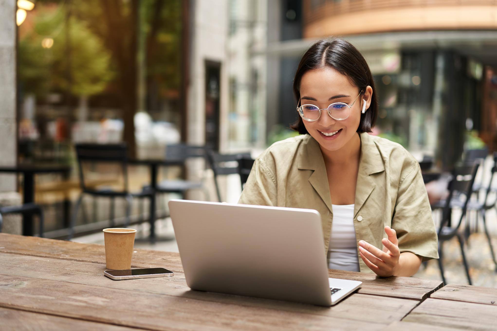 Business woman working on computer at a desk