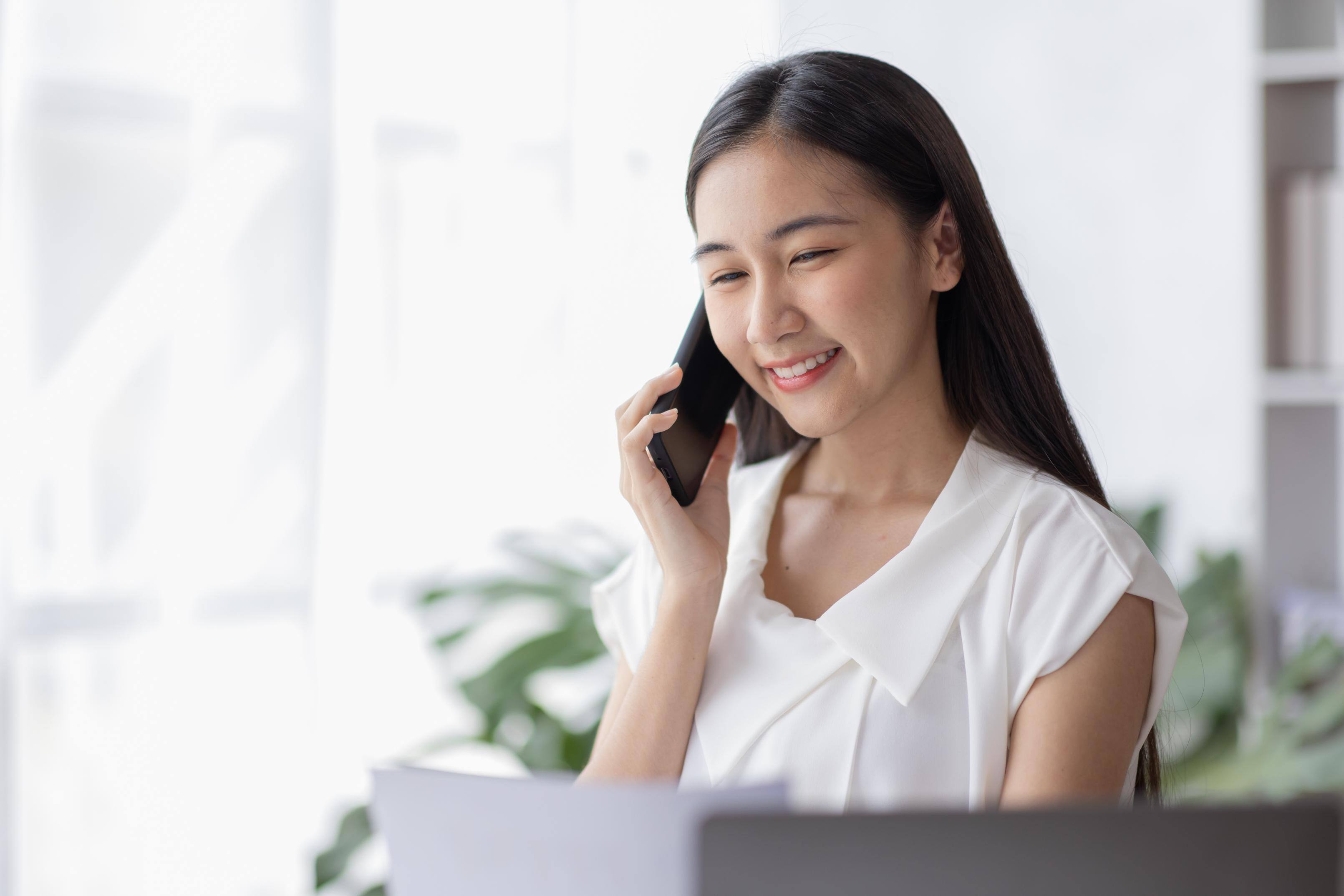 Business woman talking on the phone