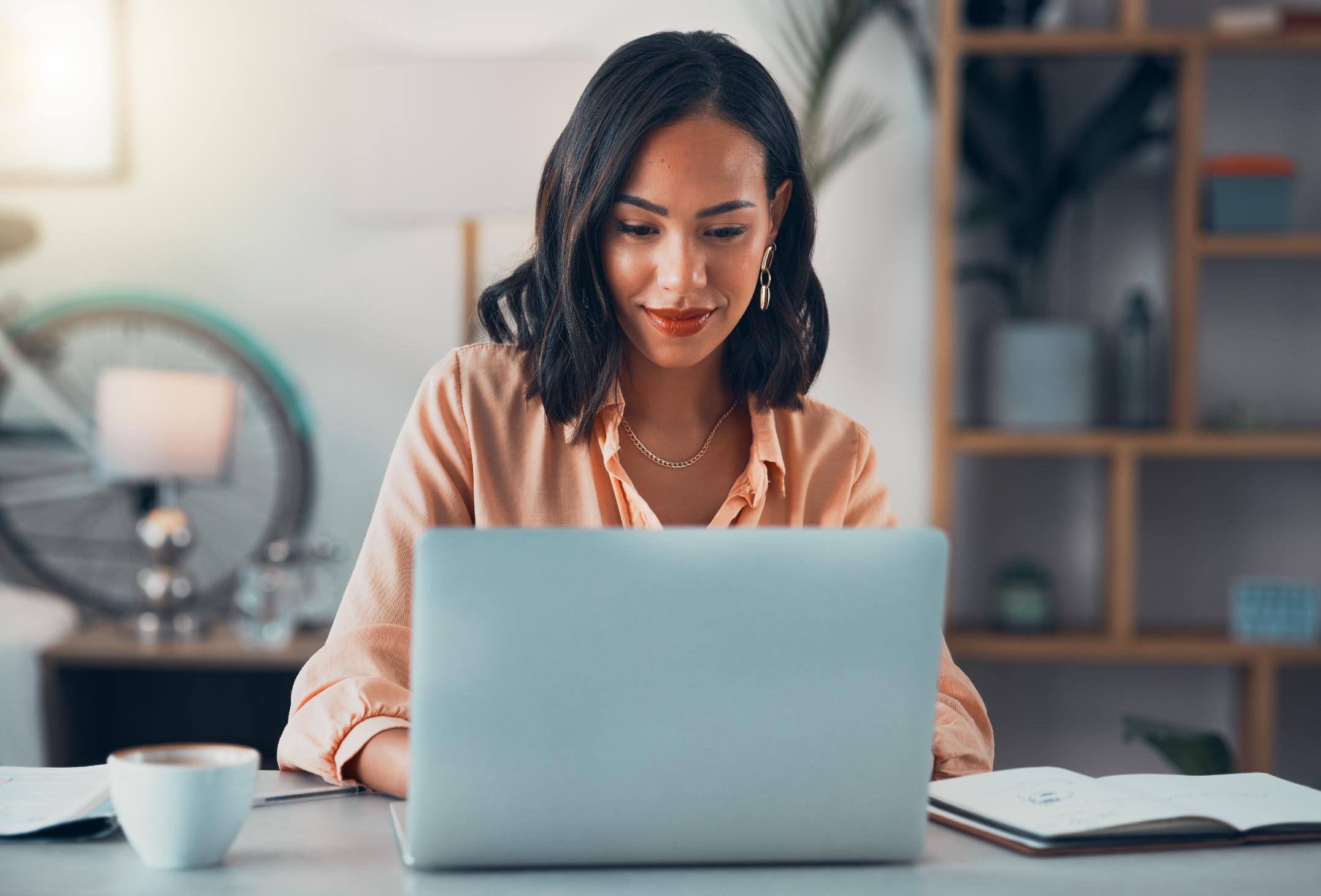 Business woman working on laptop at a desk